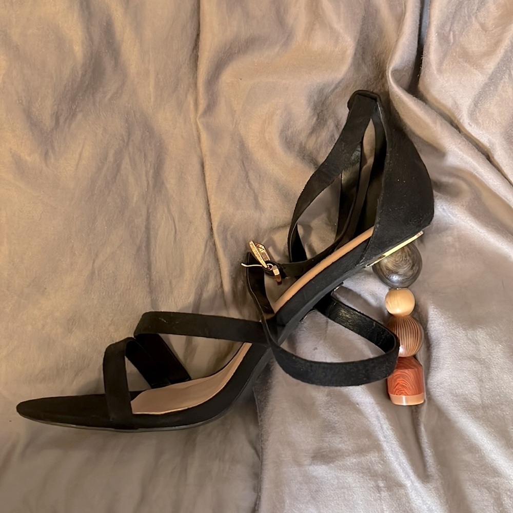ASYMMETRICAL HEEL SANDALS